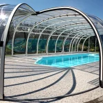 Your Pool, All Year: The Magic of Retractable Enclosures and Smart Heating